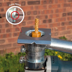motor rake with guide notch feature against a brick wall background